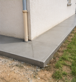 Maison après la réalisation d'un trottoir périphérique