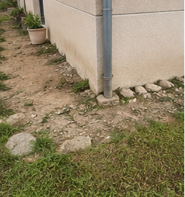 Maison avant la réalisation d'un trottoir périphérique